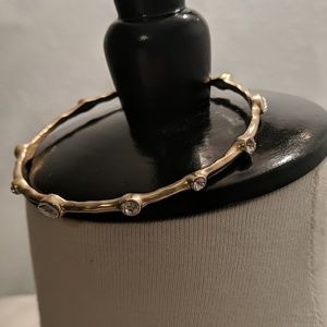 Gold bangle with rhinestones